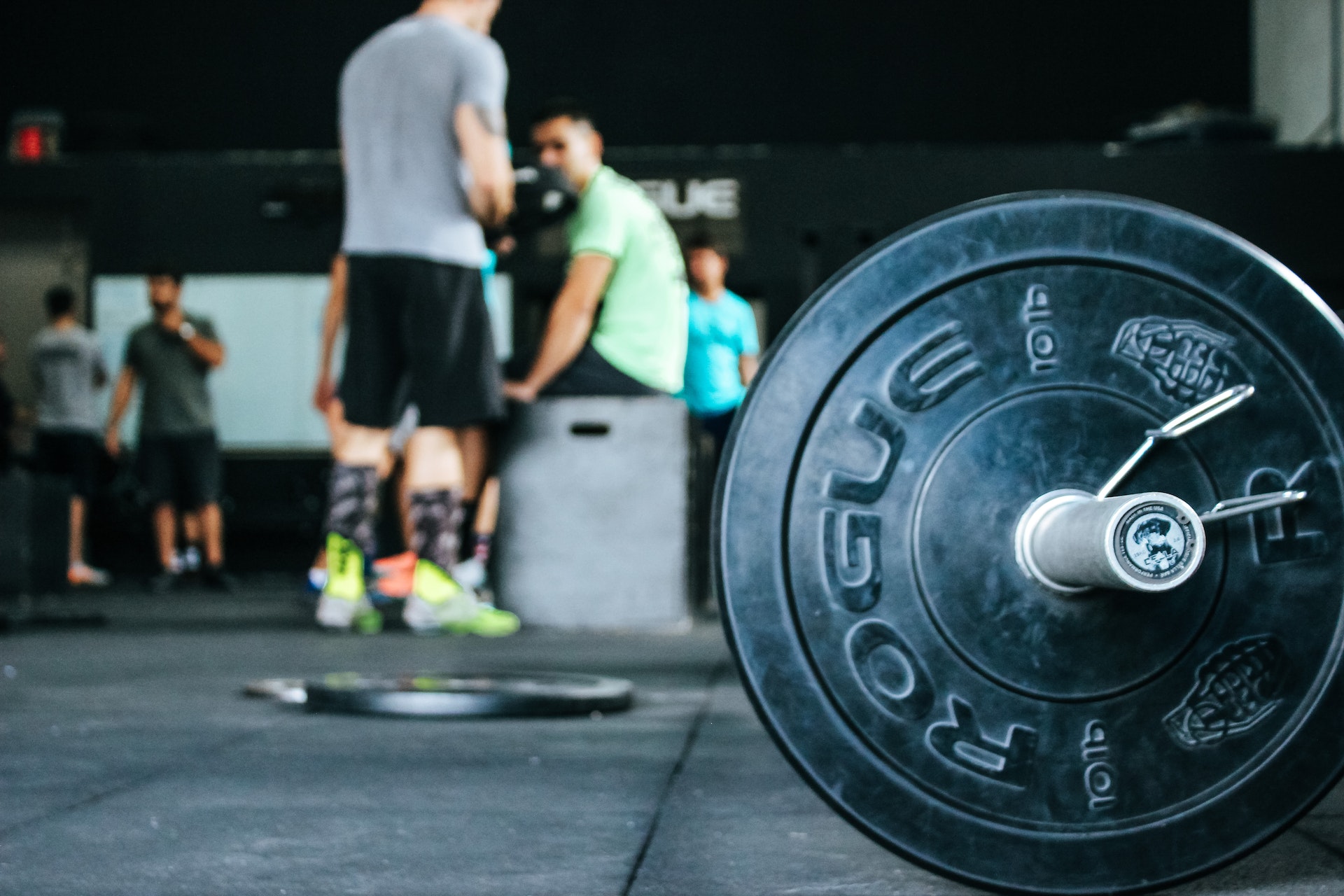 Function strength training. Man lifiting weights.